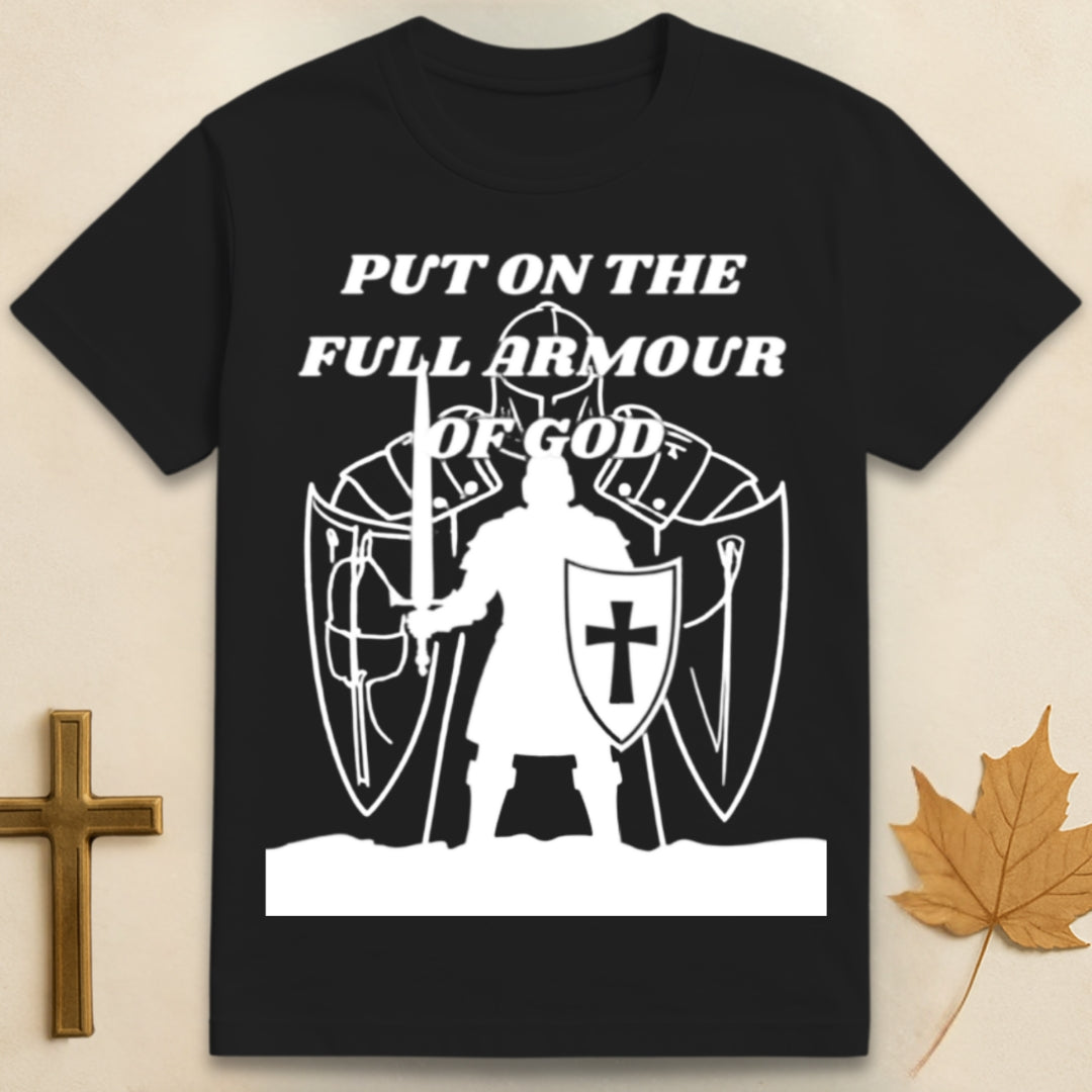 Black Armor of God t-shirt featuring medieval soldier graphic with shield bearing cross emblem and text "Put on the Full Armor of God"