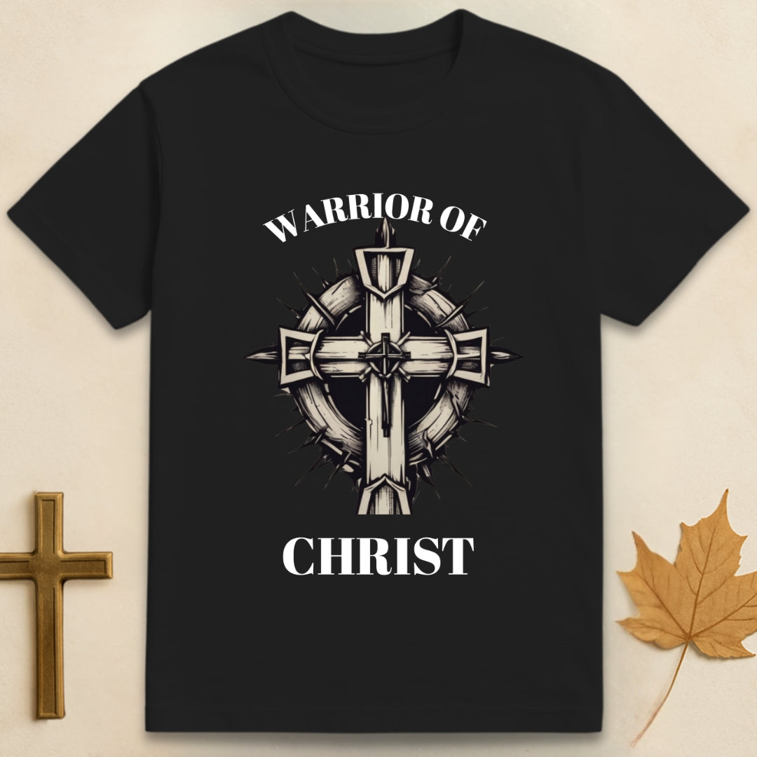 Black Warrior of Christ t-shirt with cross and thorn crown graphic, featuring text "Warrior of" above and text "Christ" below the design.