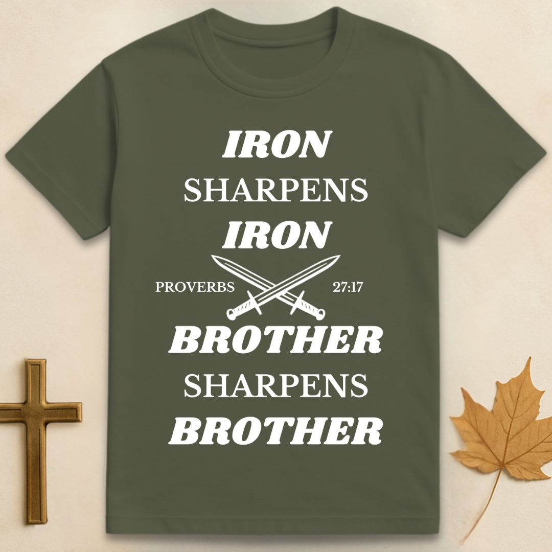 Green Iron Sharpens Iron t-shirt featuring graphic of two crossed swords with text "Iron Sharpens Iron" above and "Brother Sharpens Brother" below.