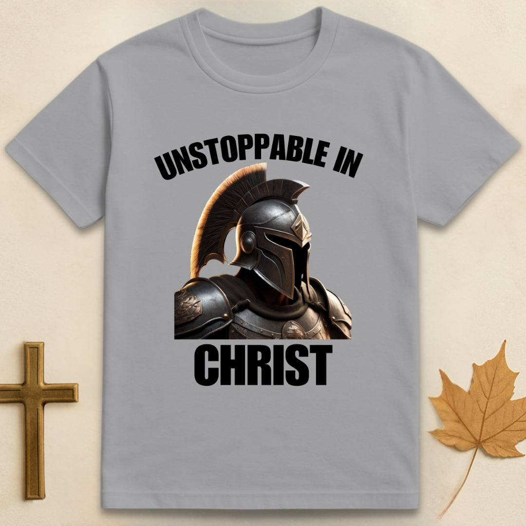 Sports grey Unstoppable In Christ t-shirt featuring Spartan-style helmet graphic with text "Unstoppable In" above and "Christ" below.