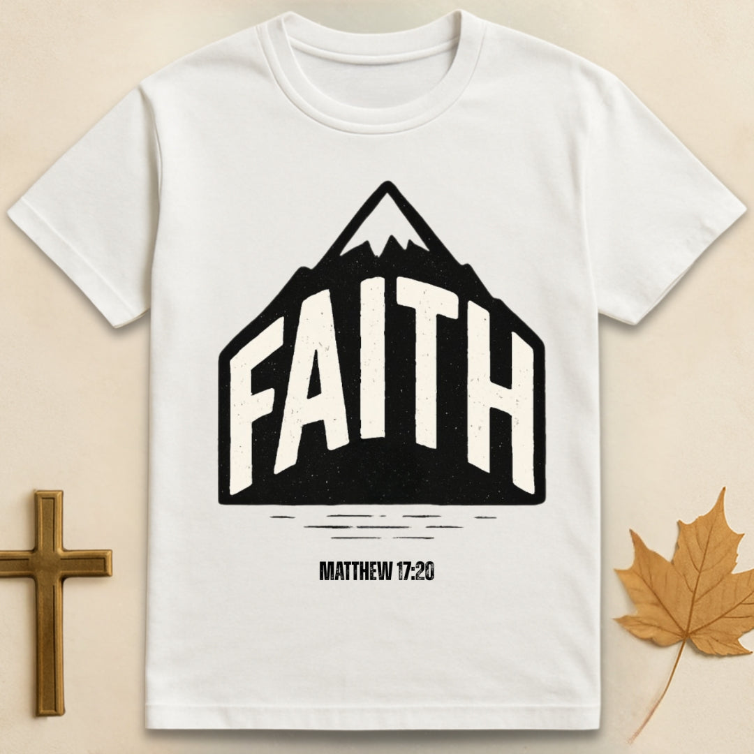 White faith can move mountains t-shirt Christian design featuring “faith” text on mountain with Matthew 17:20