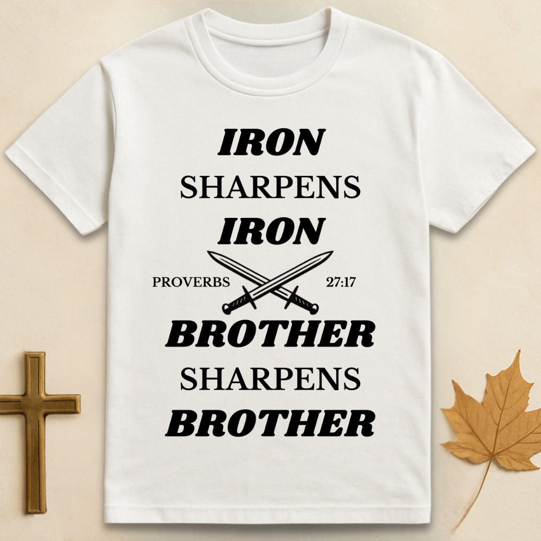 White Iron Sharpens Iron t-shirt featuring graphic of two crossed swords with text "Iron Sharpens Iron" above and "Brother Sharpens Brother" below.